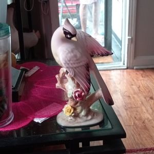 Cardinal bird figurine.